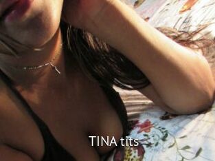 TINA_tits